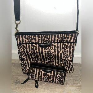 Coach leopard print crossbody file bag and a matching wallet.